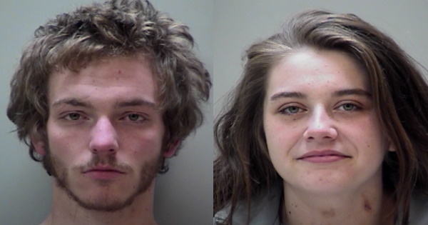 Couple accused of vehicle boost while already cruising in a stolen vehicle