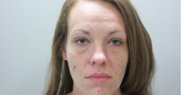 Woman admits that she was trying to inject heroin into her foot outside Dollar General