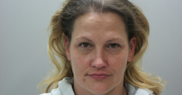 Woman found with heroin and syringes during traffic stop for window tint