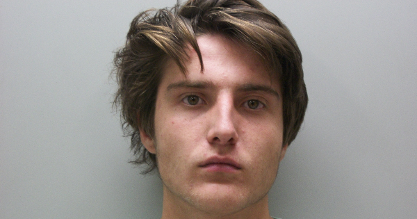 Teen charged when found with grape Johny Bootlegger while driving