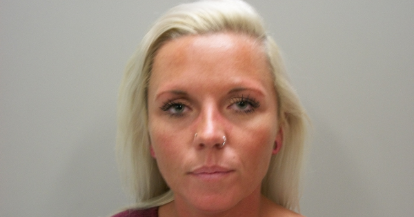 Intoxicated woman charged after zooming past trooper
